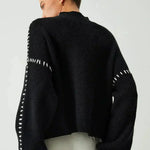 Nina ribstrikket sweater med høj hals fra Elsebeth København, detalje af strikken