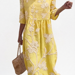 Sidonie - Casual women's dress with floral pattern.